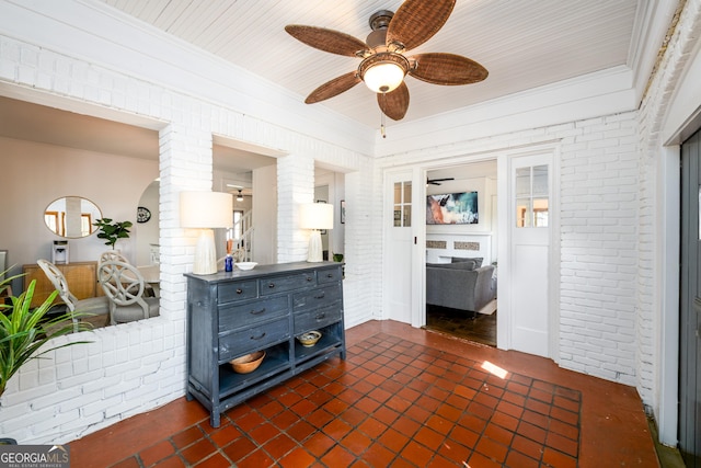 1448 N Highland Ave NE, Atlanta, GA 30306 - bedroom with brick wall, ornamental molding, and a ceiling fan