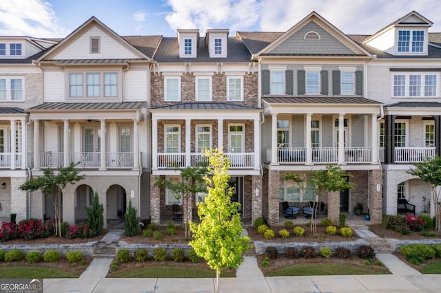 963 S On Main Dr, Woodstock, GA 30188 - multi unit property featuring a standing seam roof and a balcony