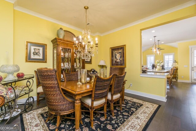 963 S On Main Dr, Woodstock, GA 30188 - dining room featuring a chandelier, baseboards, dark wood-style floors, crown molding, and recessed lighting