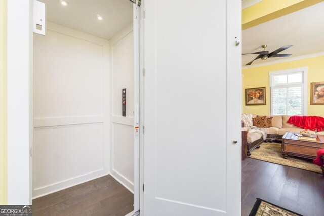 963 S On Main Dr, Woodstock, GA 30188 - corridor with dark wood-style floors, recessed lighting, elevator, and crown molding