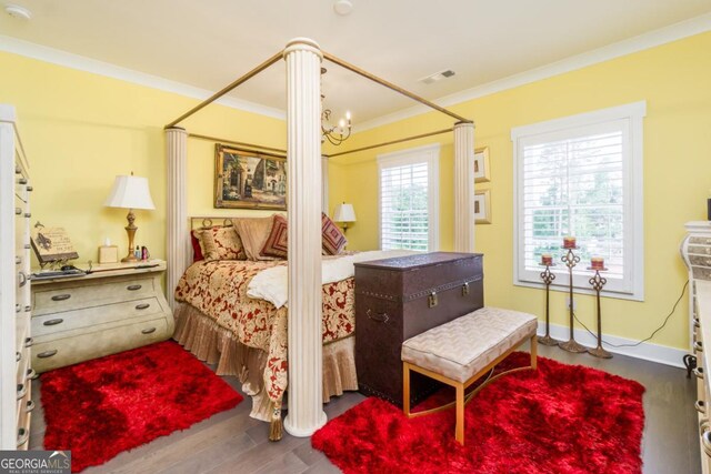 963 S On Main Dr, Woodstock, GA 30188 - bedroom with crown molding, a chandelier, and wood finished floors