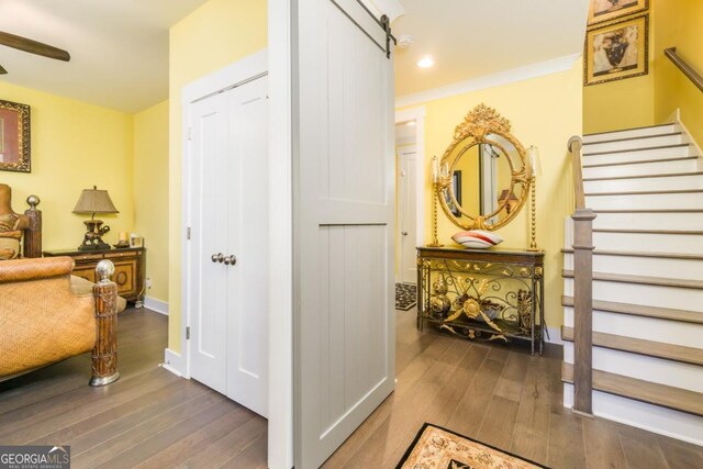 963 S On Main Dr, Woodstock, GA 30188 - hall with hardwood / wood-style floors, stairs, recessed lighting, and baseboards