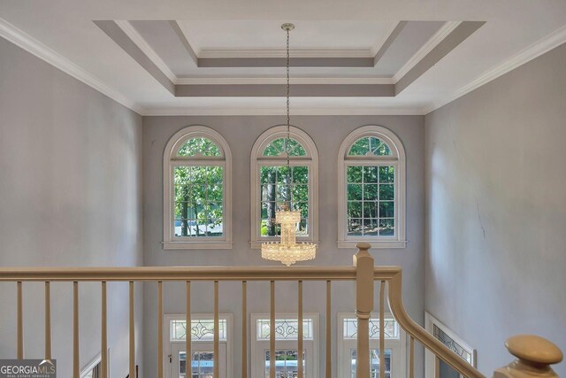 181 Sentinel Pl NE, Marietta, GA 30067 - detailed view of a chandelier, a tray ceiling, and ornamental molding
