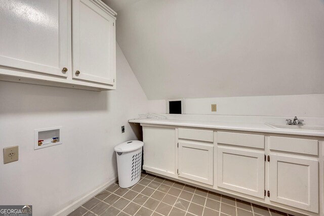 181 Sentinel Pl NE, Marietta, GA 30067 - washroom featuring cabinet space, hookup for a washing machine, baseboards, and light tile patterned floors