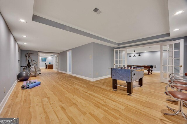 181 Sentinel Pl NE, Marietta, GA 30067 - game room featuring french doors, a tray ceiling, wood finished floors, baseboards, and recessed lighting