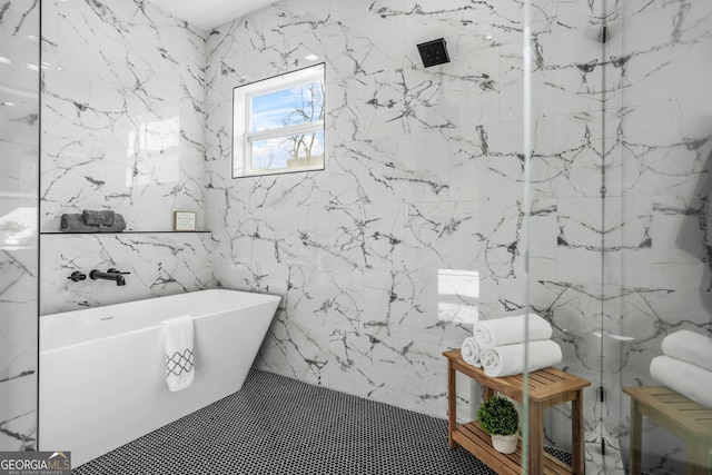 3378 Bachelor St, Atlanta, GA 30344 - full bath featuring tile walls, a freestanding bath, and a marble finish shower