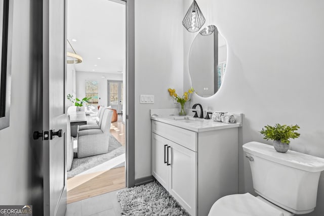 3378 Bachelor St, Atlanta, GA 30344 - bathroom featuring vanity, toilet, tile patterned flooring, and recessed lighting