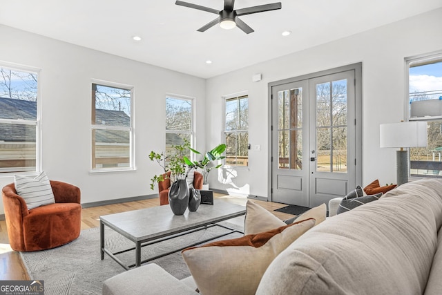 3378 Bachelor St, Atlanta, GA 30344 - living room with plenty of natural light, french doors, light wood-type flooring, a ceiling fan, and recessed lighting