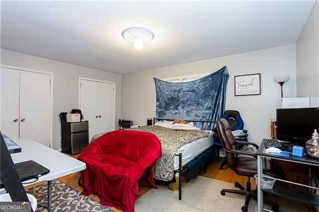 2620 Clairmont Rd, Atlanta, GA 30329 - bedroom with a desk and wood finished floors