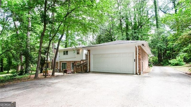 2620 Clairmont Rd, Atlanta, GA 30329 - view of front of home with brick siding and driveway