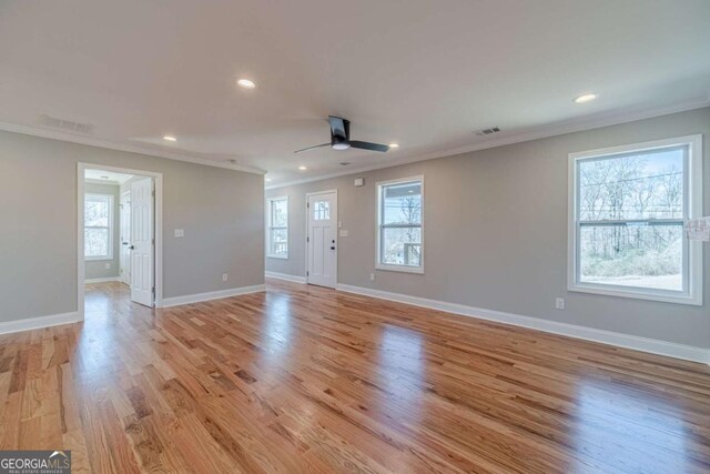 2741 Pierce Rd, Gainesville, GA 30507 - unfurnished living room with crown molding, ceiling fan, baseboards, recessed lighting, and light wood-type flooring