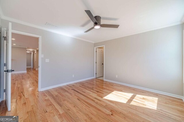 2741 Pierce Rd, Gainesville, GA 30507 - empty room with a ceiling fan, light wood finished floors, ornamental molding, and baseboards