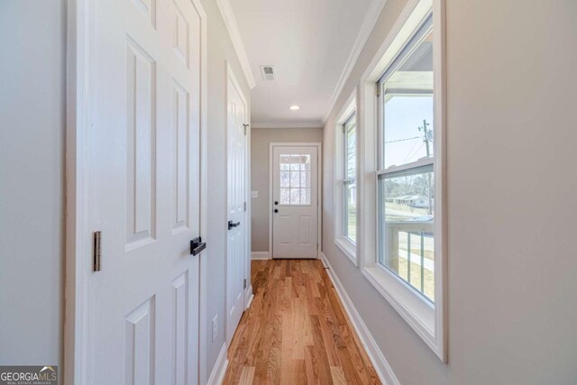 2741 Pierce Rd, Gainesville, GA 30507 - doorway to outside with crown molding, light wood finished floors, baseboards, and recessed lighting