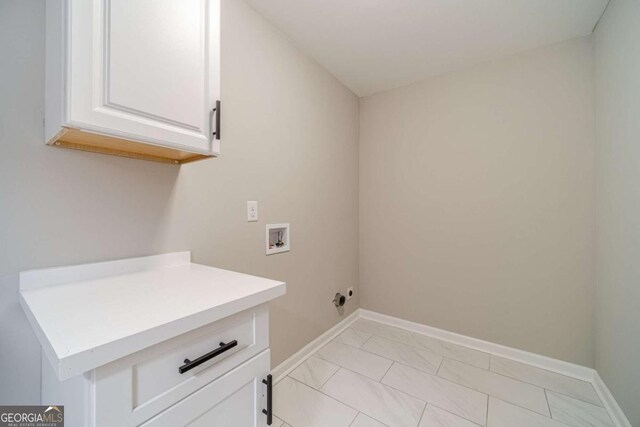2741 Pierce Rd, Gainesville, GA 30507 - washroom with cabinet space, hookup for a washing machine, baseboards, and light marble finish floors