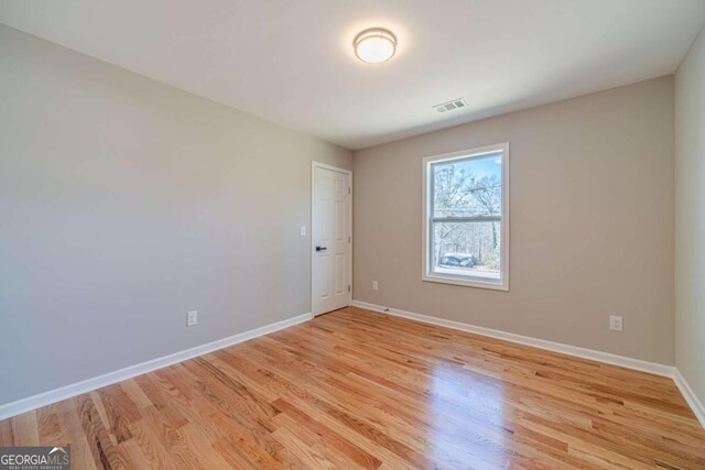 2741 Pierce Rd, Gainesville, GA 30507 - unfurnished room with baseboards and light wood-type flooring