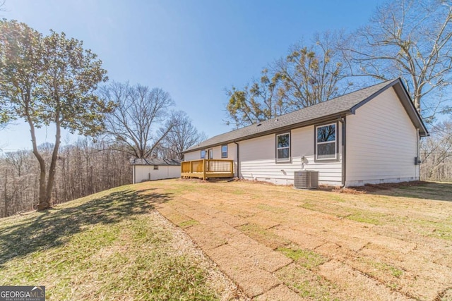 2741 Pierce Rd, Gainesville, GA 30507 - view of front of house featuring a wooden deck, crawl space, a front lawn, and central AC