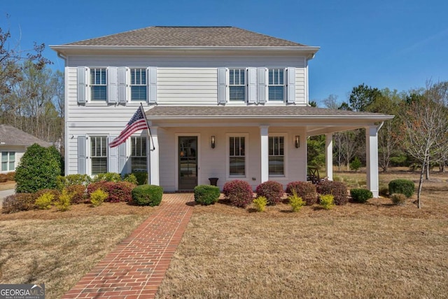 2970 Greenleffe Dr, Statham, GA 30666 - view of front of property featuring a front lawn, covered porch, and a shingled roof