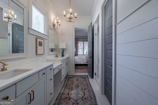 2970 Greenleffe Dr, Statham, GA 30666 - full bath featuring a chandelier, crown molding, ensuite bathroom, double vanity, and tile patterned floors