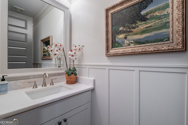 2970 Greenleffe Dr, Statham, GA 30666 - bathroom featuring a decorative wall, vanity, and a wainscoted wall