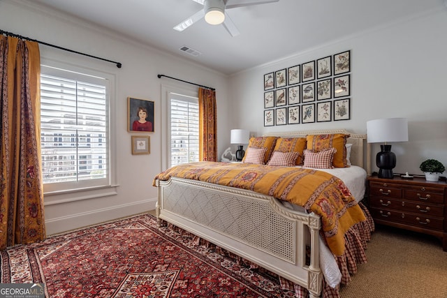 2970 Greenleffe Dr, Statham, GA 30666 - bedroom with multiple windows, ornamental molding, a ceiling fan, and carpet flooring