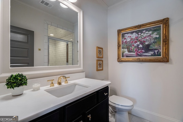 2970 Greenleffe Dr, Statham, GA 30666 - full bathroom with a shower stall, vanity, toilet, tile patterned flooring, and ornamental molding