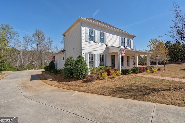 2970 Greenleffe Dr, Statham, GA 30666 - view of front of house featuring covered porch and concrete driveway