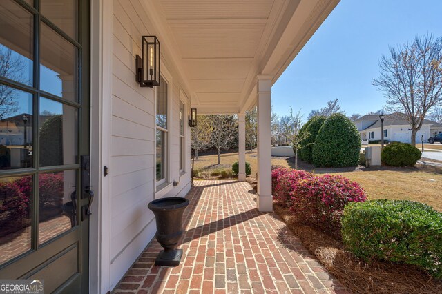 2970 Greenleffe Dr, Statham, GA 30666 - view of patio with a porch