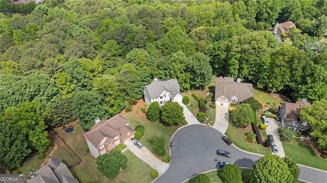 aerial overview of property's location featuring a forest