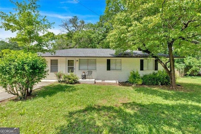 5 Beaureguard St, Cartersville, GA 30120 - ranch-style home with a front yard, brick siding, and covered porch