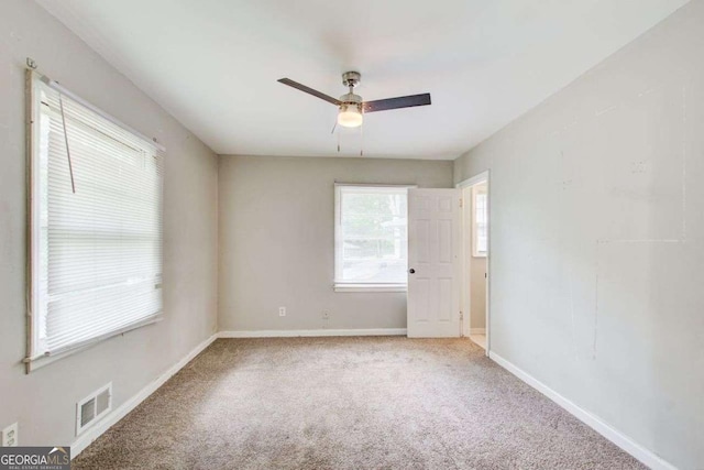2564 Riggs Dr, East Point, GA 30344 - unfurnished room featuring a ceiling fan and carpet