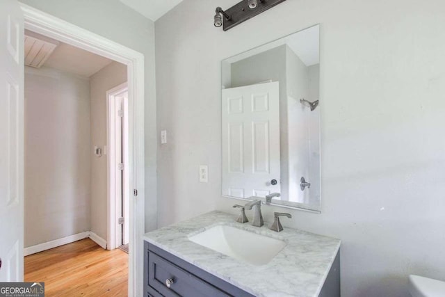2564 Riggs Dr, East Point, GA 30344 - bathroom with vanity and wood finished floors