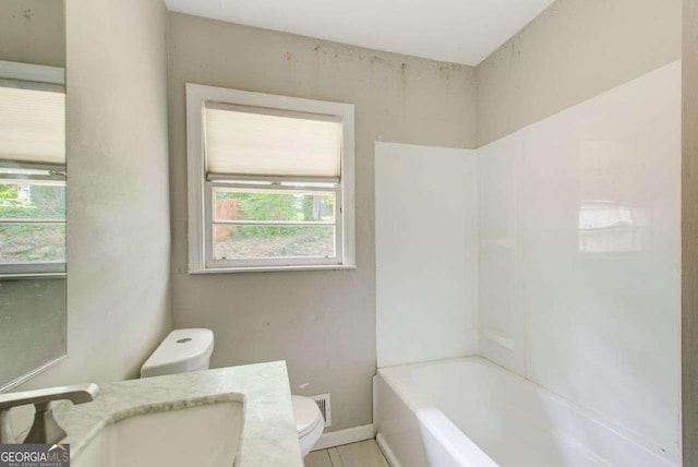 2564 Riggs Dr, East Point, GA 30344 - full bath featuring toilet and tile patterned flooring