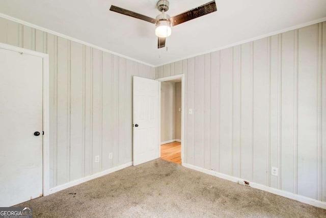 2564 Riggs Dr, East Point, GA 30344 - unfurnished bedroom with carpet floors, crown molding, and ceiling fan