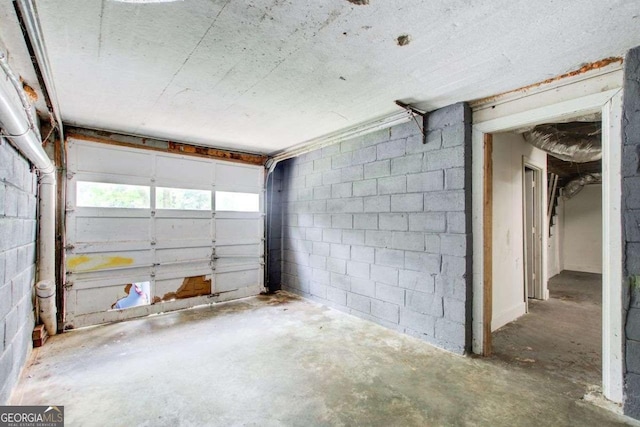 2564 Riggs Dr, East Point, GA 30344 - garage featuring concrete block wall