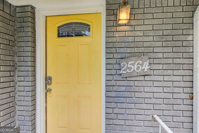 2564 Riggs Dr, East Point, GA 30344 - entrance to property with brick siding