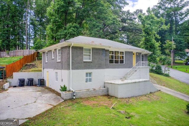 2564 Riggs Dr, East Point, GA 30344 - view of front of home with brick siding and stairs