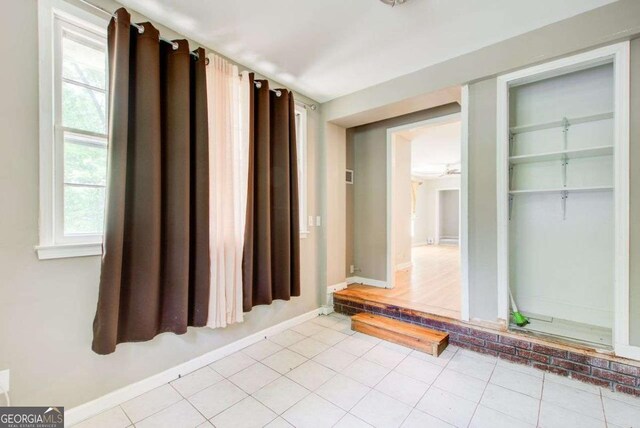 2564 Riggs Dr, East Point, GA 30344 - bathroom with baseboards and tile patterned flooring