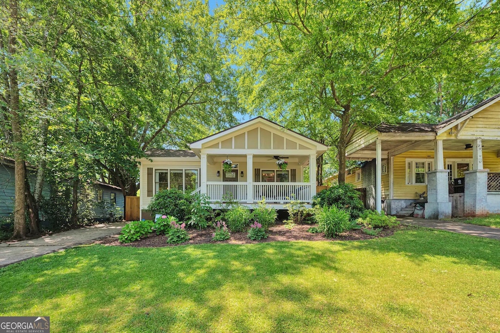 1443 Metropolitan Ave SE, Atlanta, GA 30316 - view of front facade featuring covered porch, a ceiling fan, and a front yard