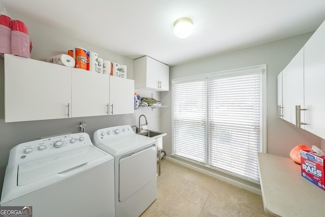 4135 Creekwood Dr, Cumming, GA 30041 - washroom featuring cabinet space, washing machine and clothes dryer, and baseboards