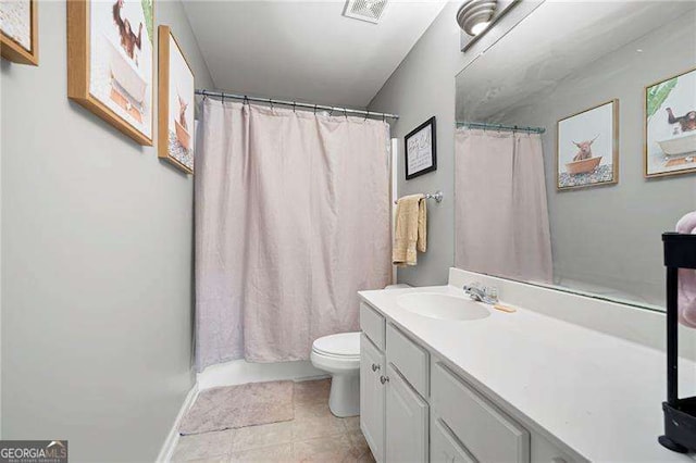 40 Boulder Ct, Dallas, GA 30132 - full bathroom with vanity, toilet, curtained shower, and tile patterned flooring