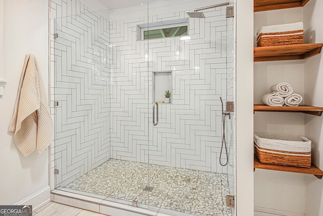 1231 Mansfield Ave NE, Atlanta, GA 30307 - bathroom with a stall shower and baseboards