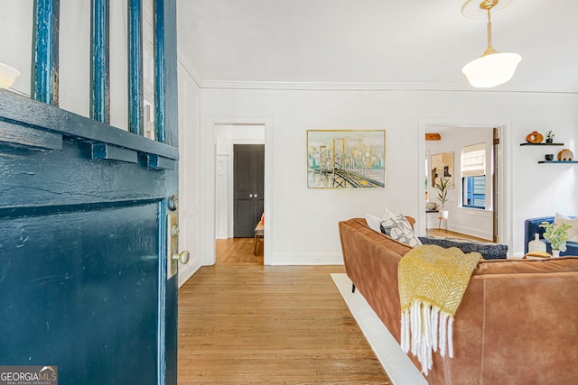 1231 Mansfield Ave NE, Atlanta, GA 30307 - hall with ornamental molding and light wood-style flooring