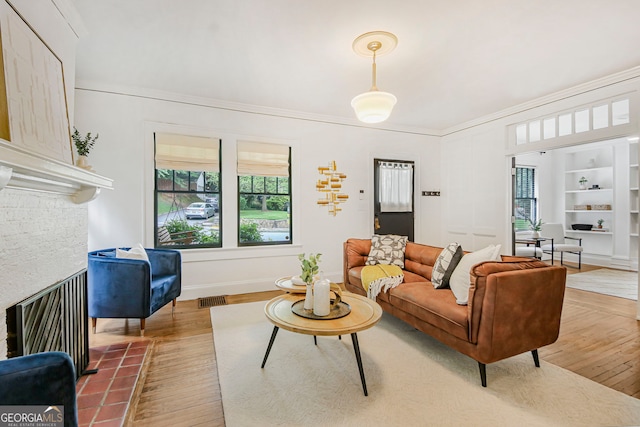 1231 Mansfield Ave NE, Atlanta, GA 30307 - living area featuring wood finished floors and crown molding