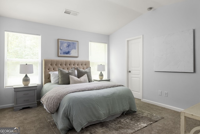 4457 Watson Ridge Dr, Stone Mountain, GA 30083 - carpeted bedroom with vaulted ceiling and baseboards