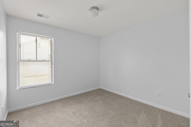 4457 Watson Ridge Dr, Stone Mountain, GA 30083 - carpeted spare room featuring baseboards