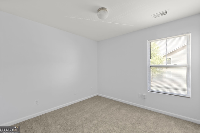 4457 Watson Ridge Dr, Stone Mountain, GA 30083 - carpeted empty room with baseboards