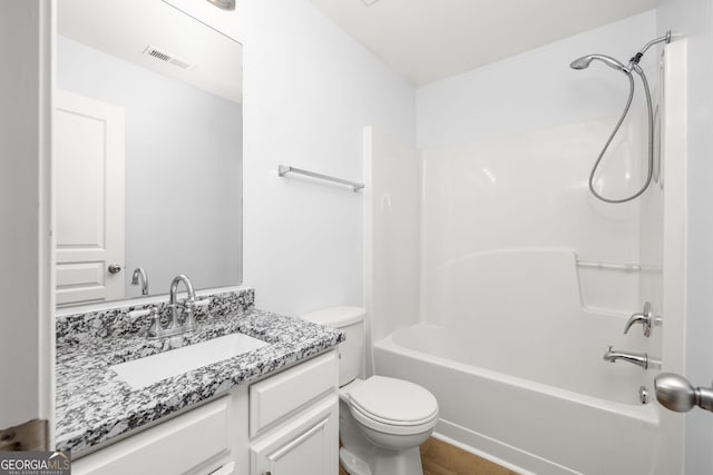 4457 Watson Ridge Dr, Stone Mountain, GA 30083 - full bathroom featuring toilet, vanity, and shower / tub combination