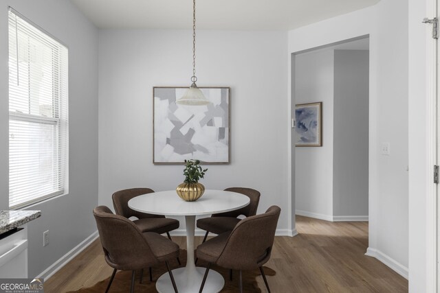 4457 Watson Ridge Dr, Stone Mountain, GA 30083 - dining space featuring wood finished floors and baseboards