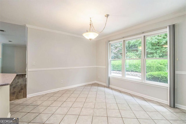 703 Kirkwood Cir, Woodstock, GA 30189 - unfurnished dining area with ornamental molding, baseboards, and light tile patterned floors