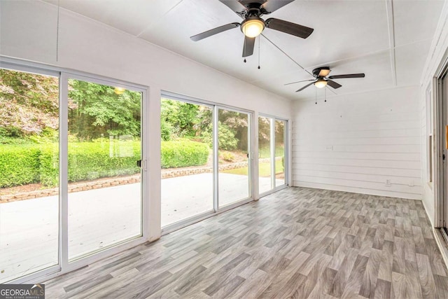 703 Kirkwood Cir, Woodstock, GA 30189 - unfurnished sunroom featuring ceiling fan